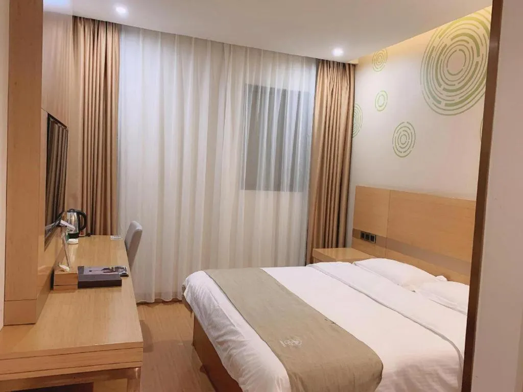 Bed in GreenTree Inn Suzhou Changshu North Haiyu Road Changhui Square Express Hotel