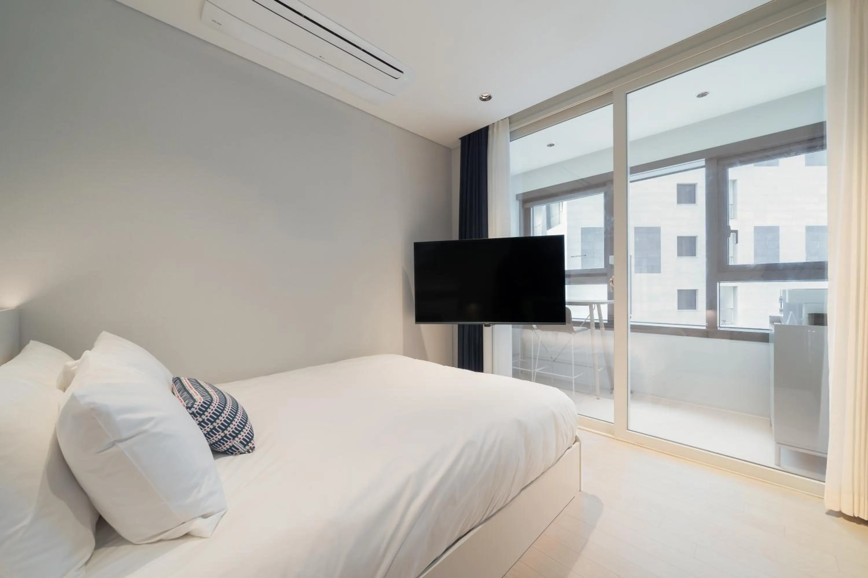 Bed in Le Collective Haeundae Paragraf