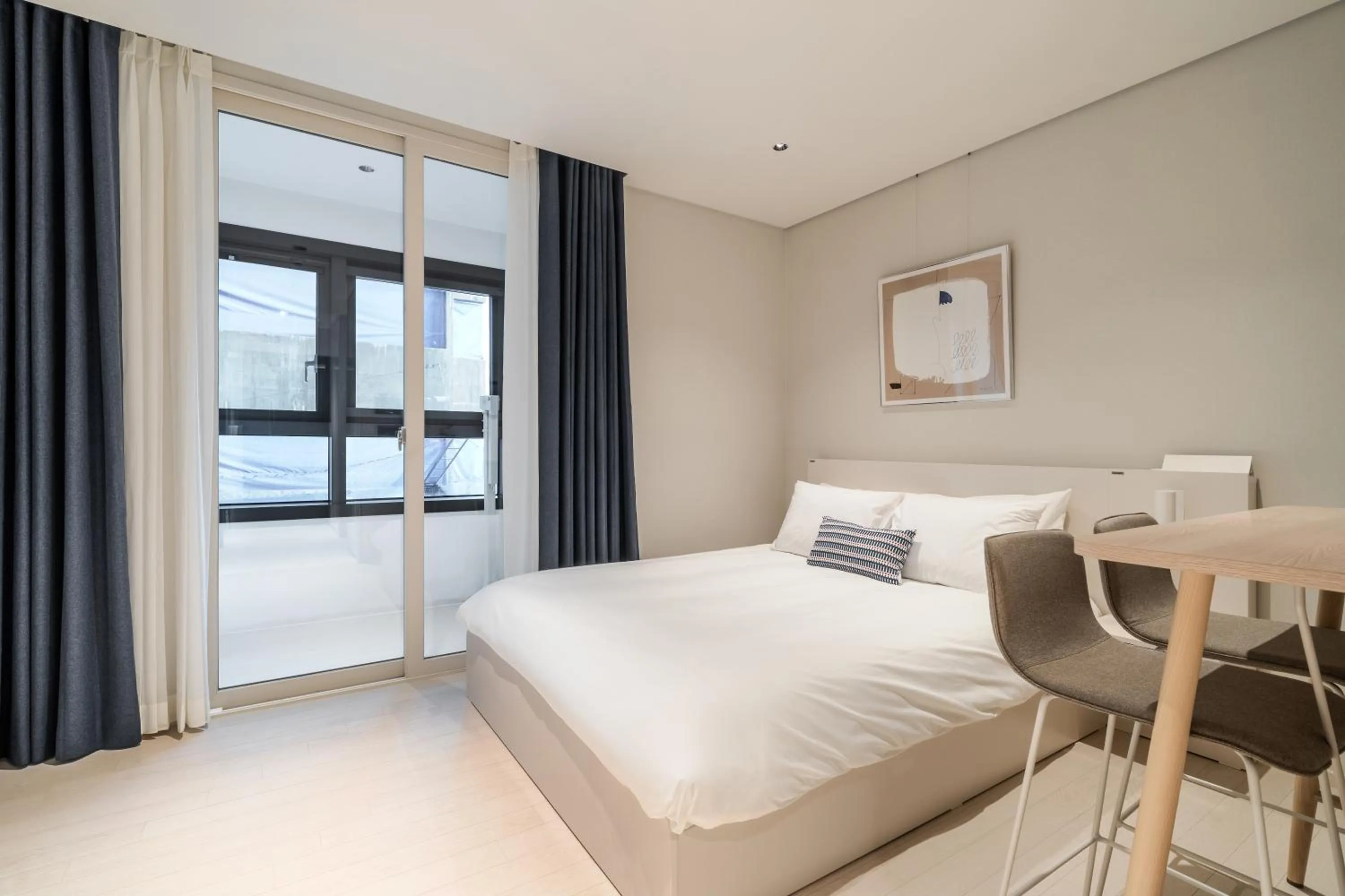 Bed in Le Collective Haeundae Paragraf