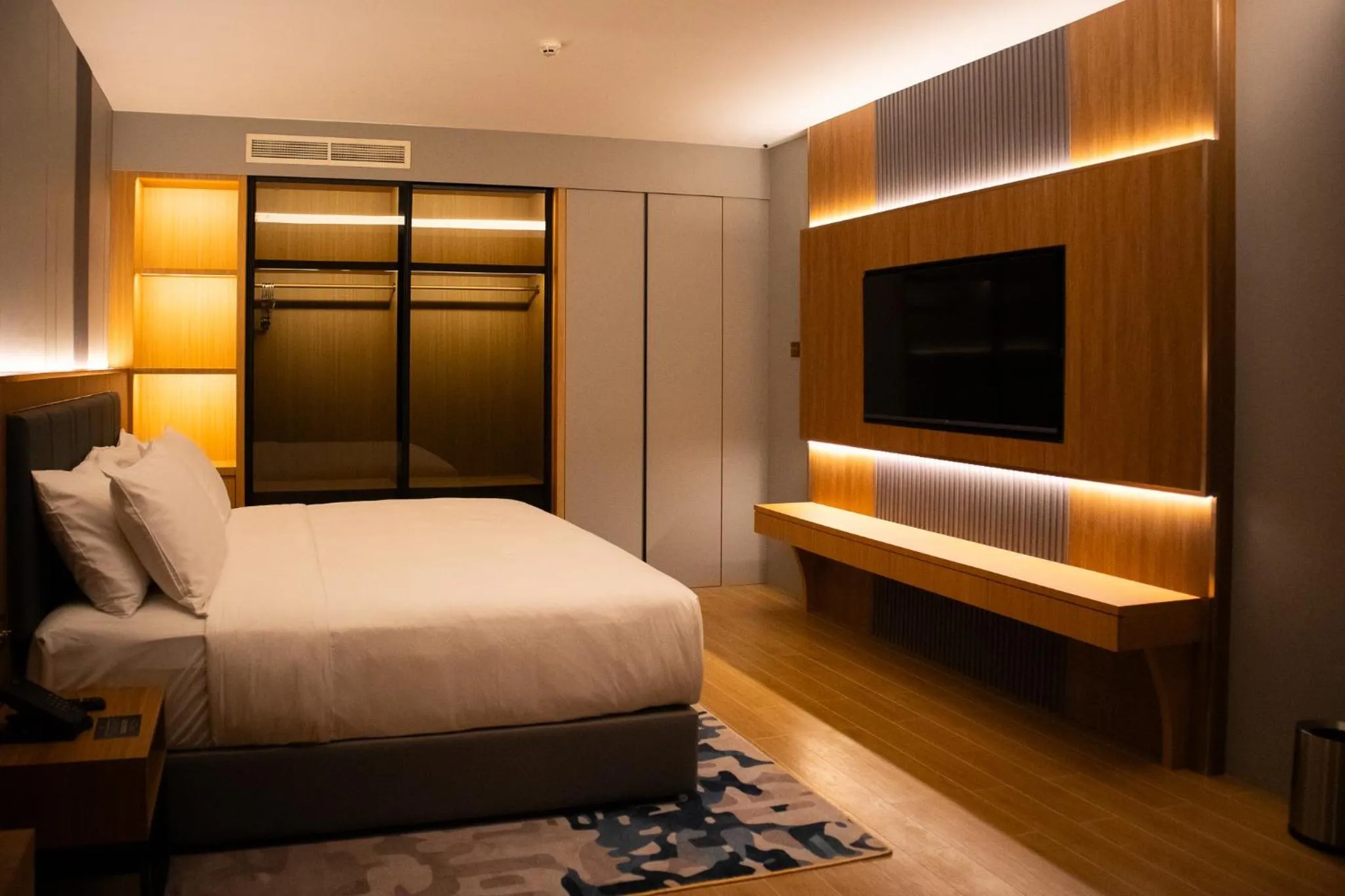 Bed in Aglow Hotel Harbor Bay Batam