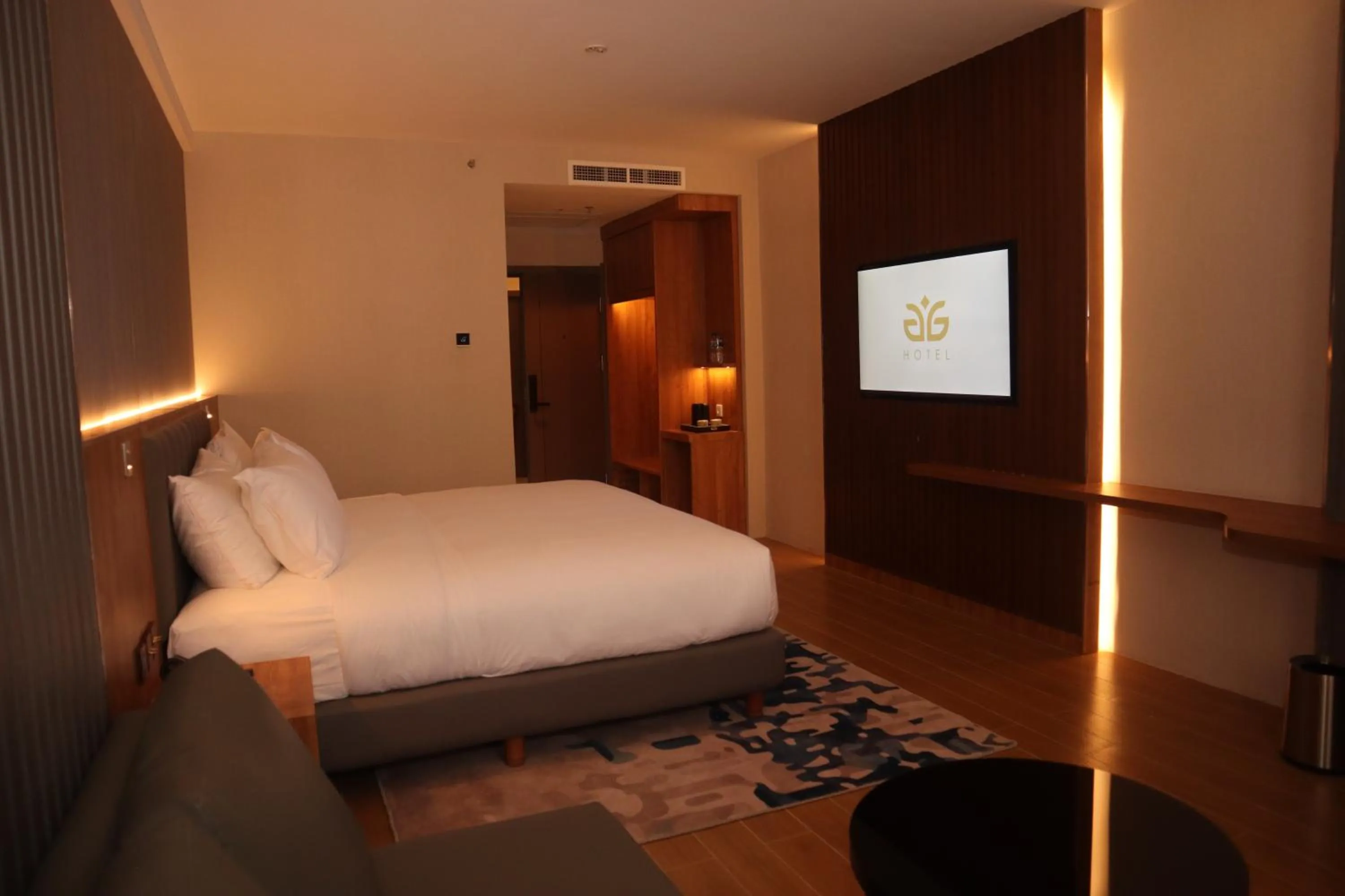 Bed in Aglow Hotel Harbor Bay Batam