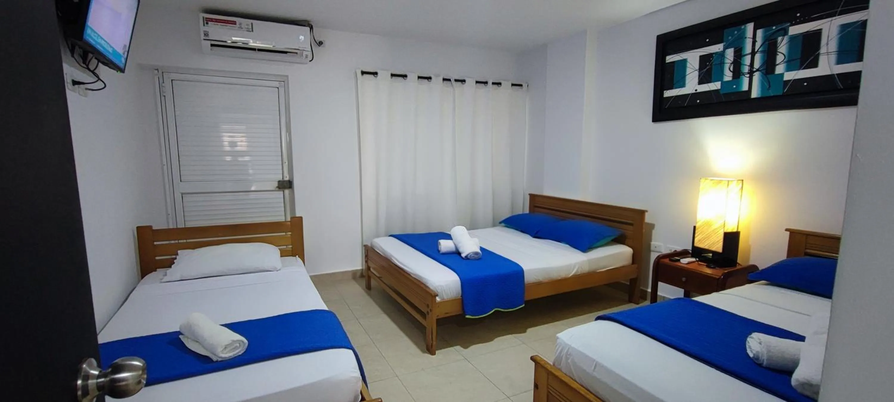 Bedroom, Bed in Caribbean Island Hotel piso 1