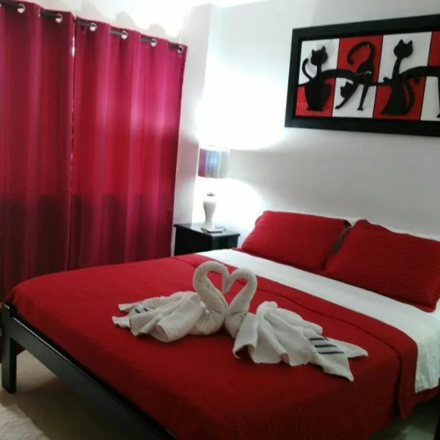 Photo of the whole room, Bed in Caribbean Island Hotel piso 1