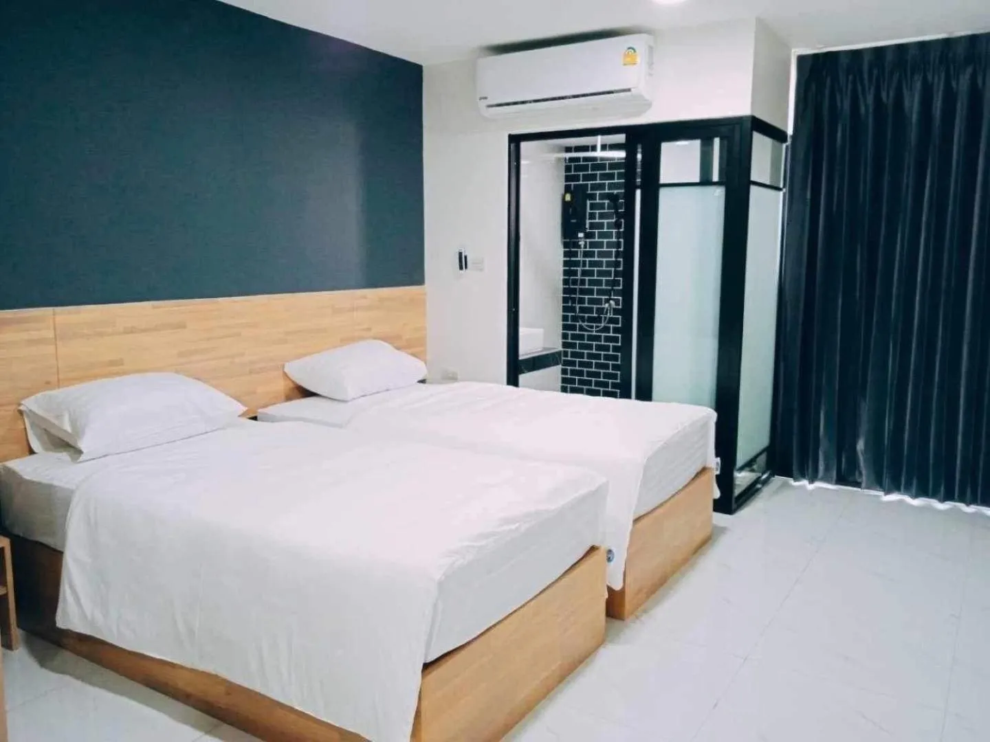 Bed in OK Hotel Bangkok