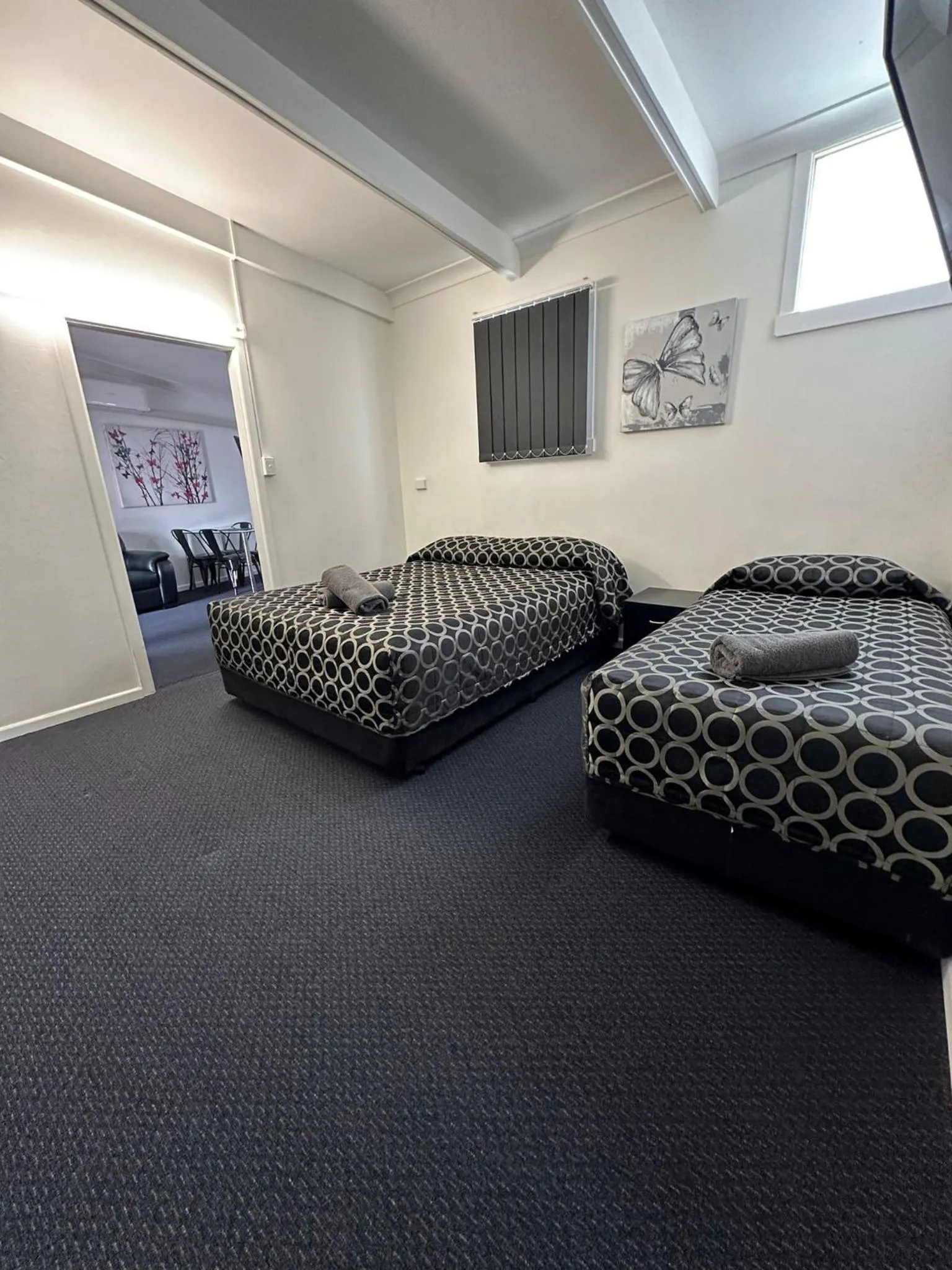 Bed in Twin Swans Motel