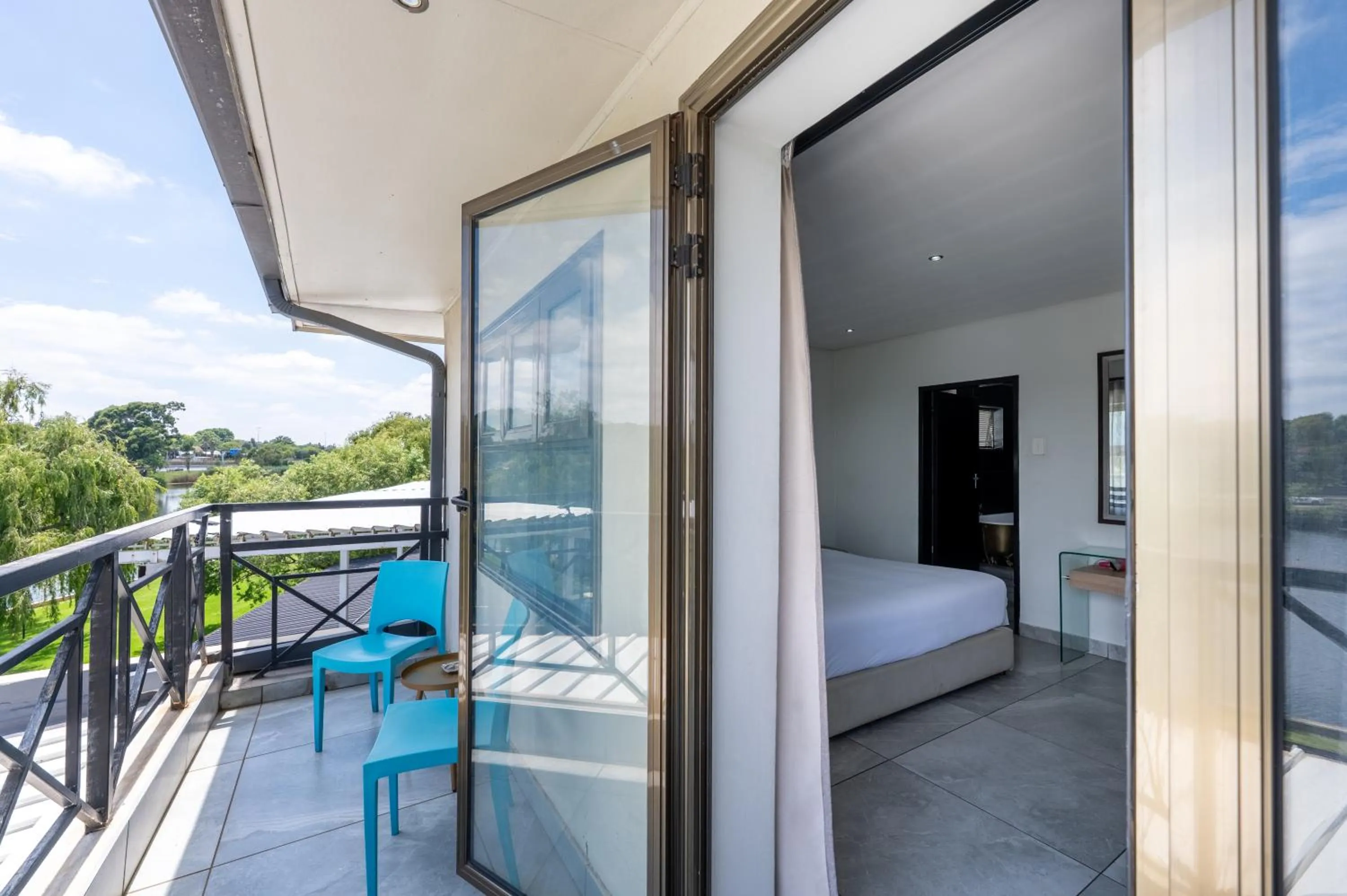 Patio, Bed in ANEW Hotel & Convention Centre OR Tambo Johannesburg