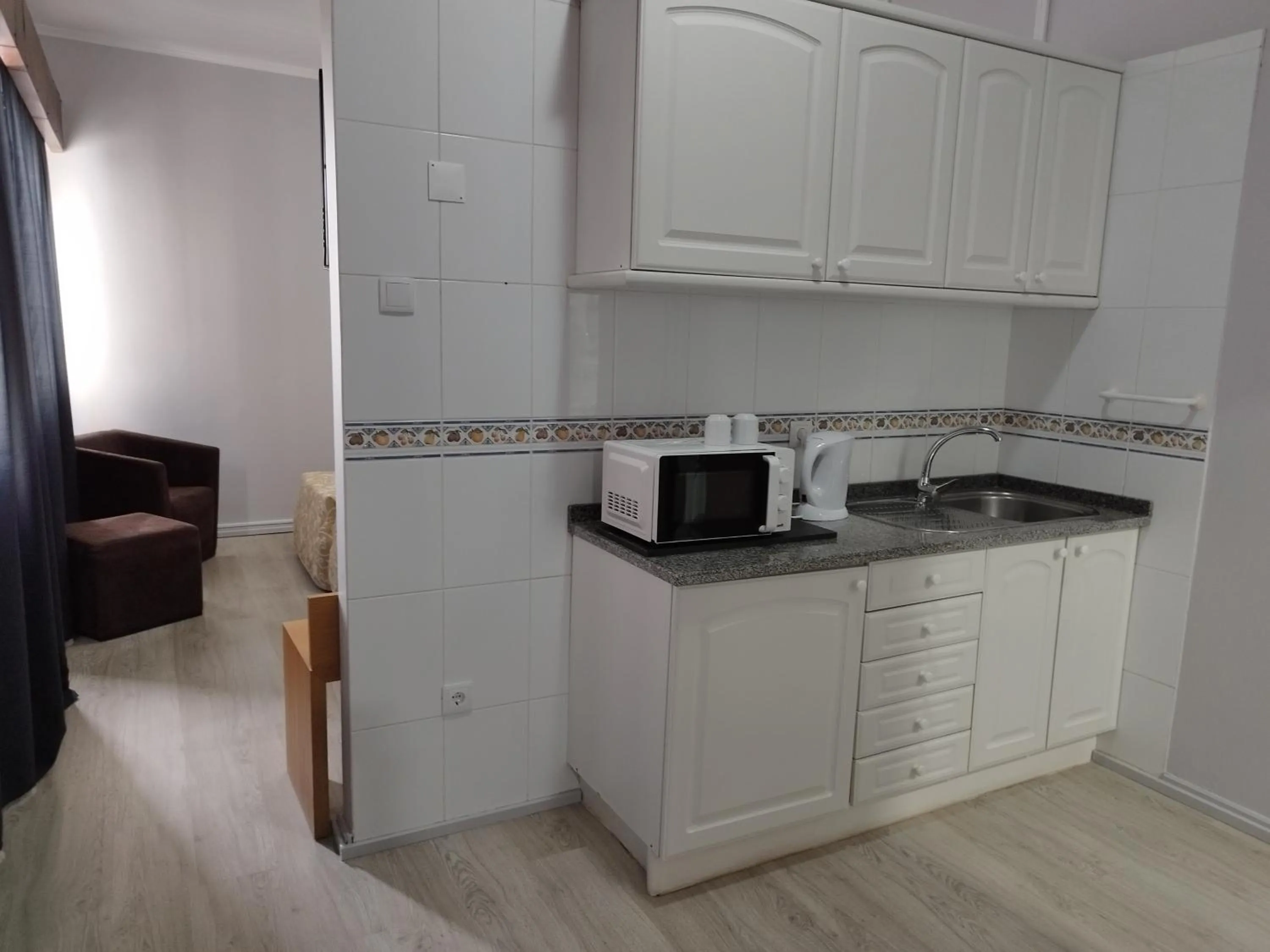 Kitchen or kitchenette in Alojamento Central II