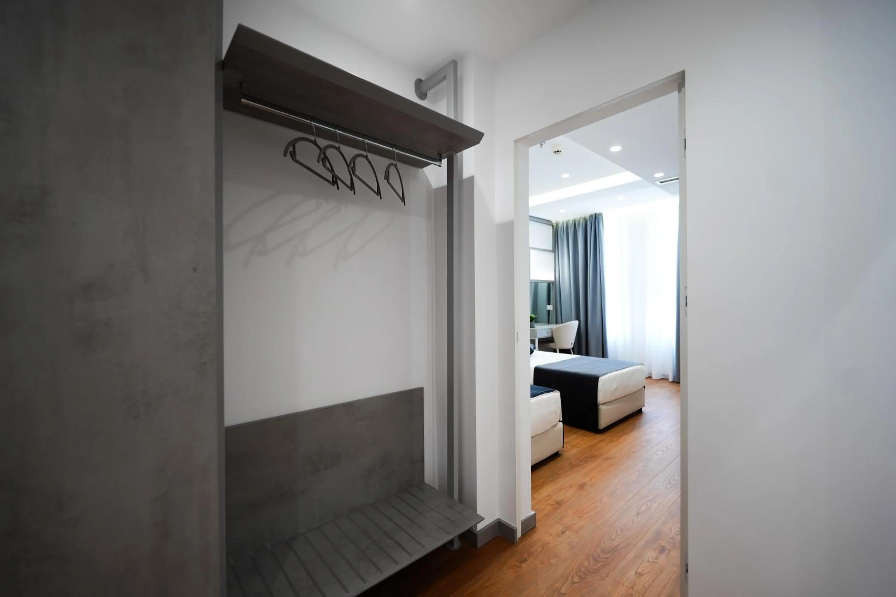 Photo of the whole room, Bed in Naos Luxury Hotel