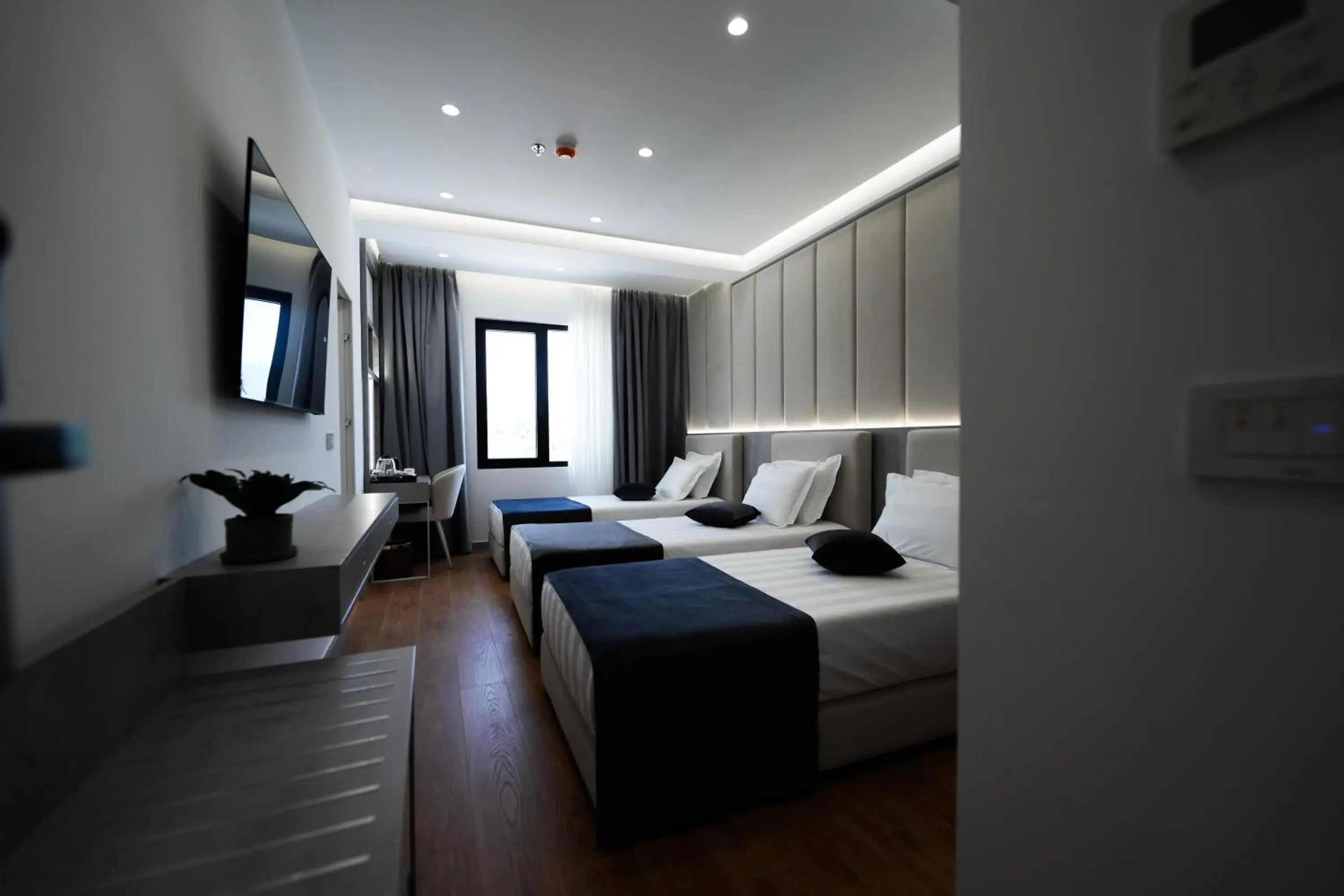 Triple Room with Balcony in Naos Luxury Hotel Triple Room with Balcony in Naos Luxury Hotel