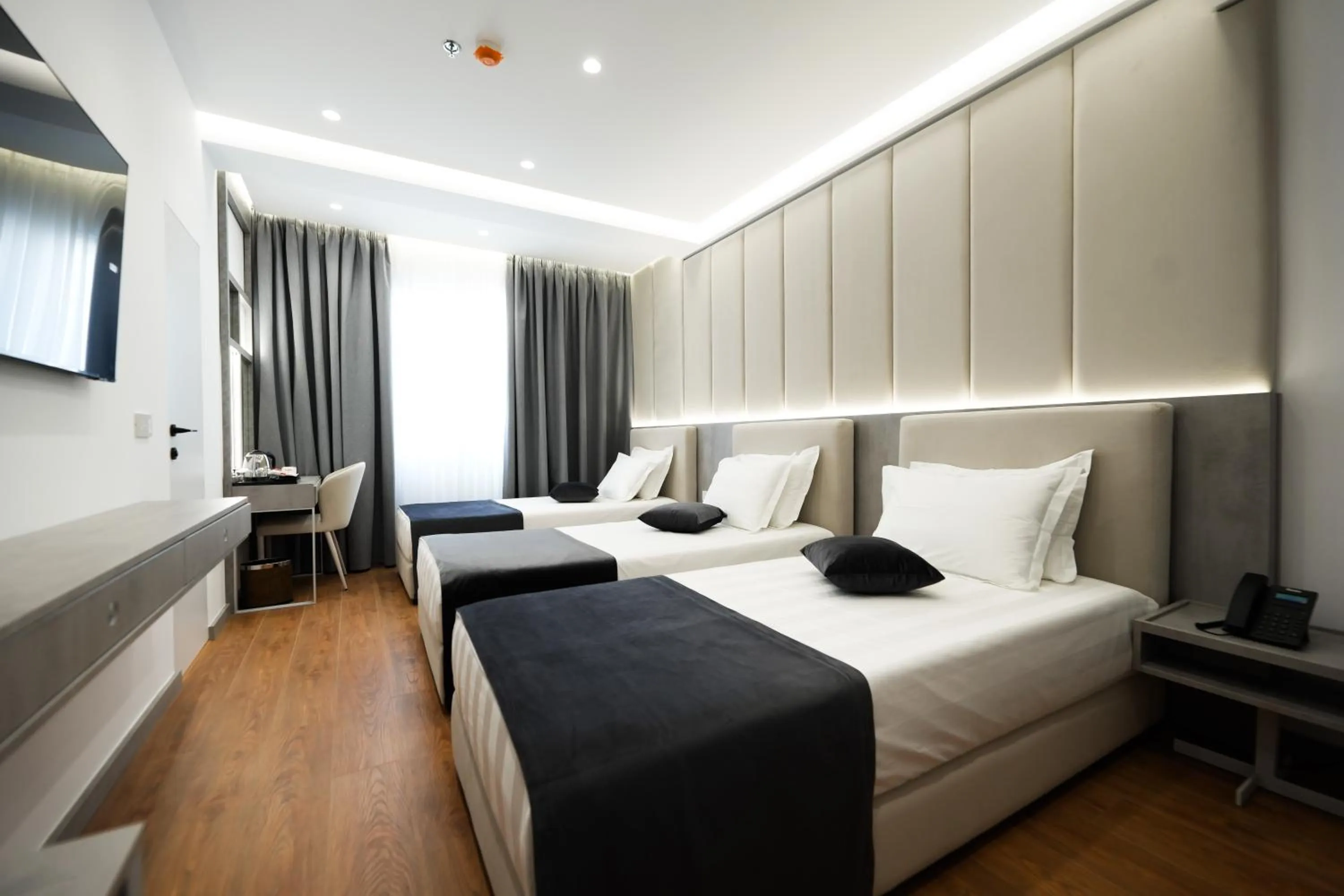 Photo of the whole room, Bed in Naos Luxury Hotel