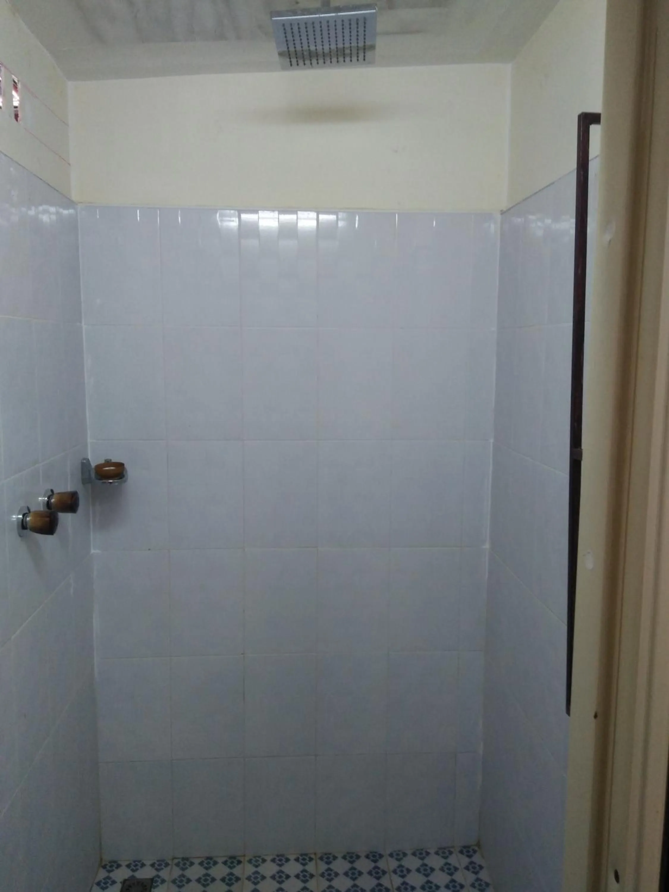 Shower in Northern Breeze Hotel