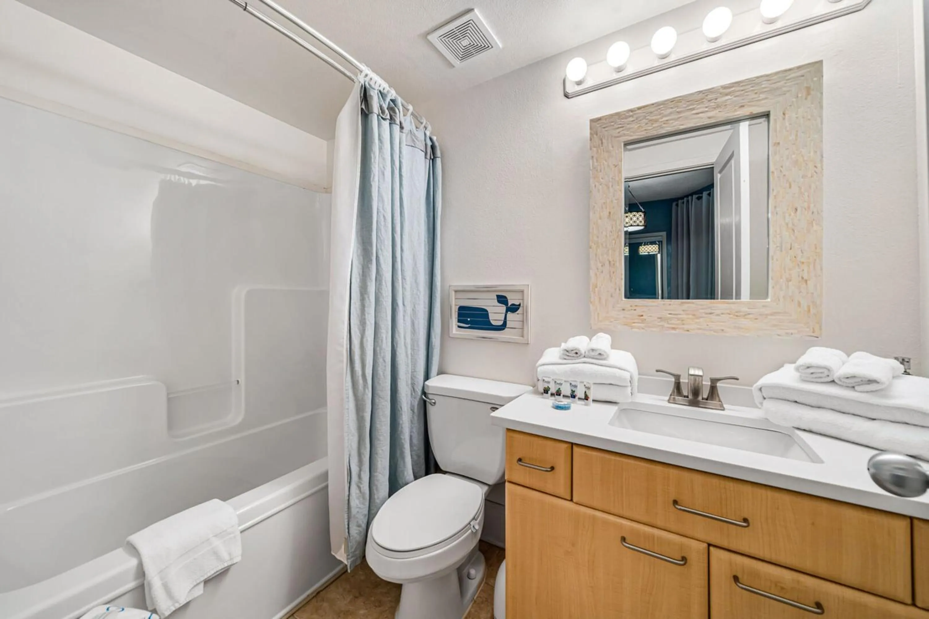 Bathroom in Caribe Resort by Hosteeva