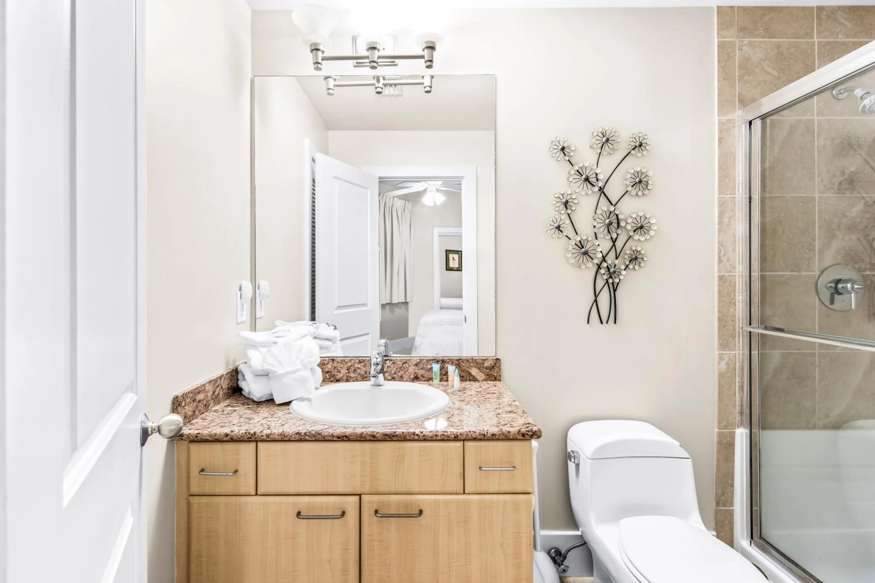 Bathroom in Caribe Resort by Hosteeva