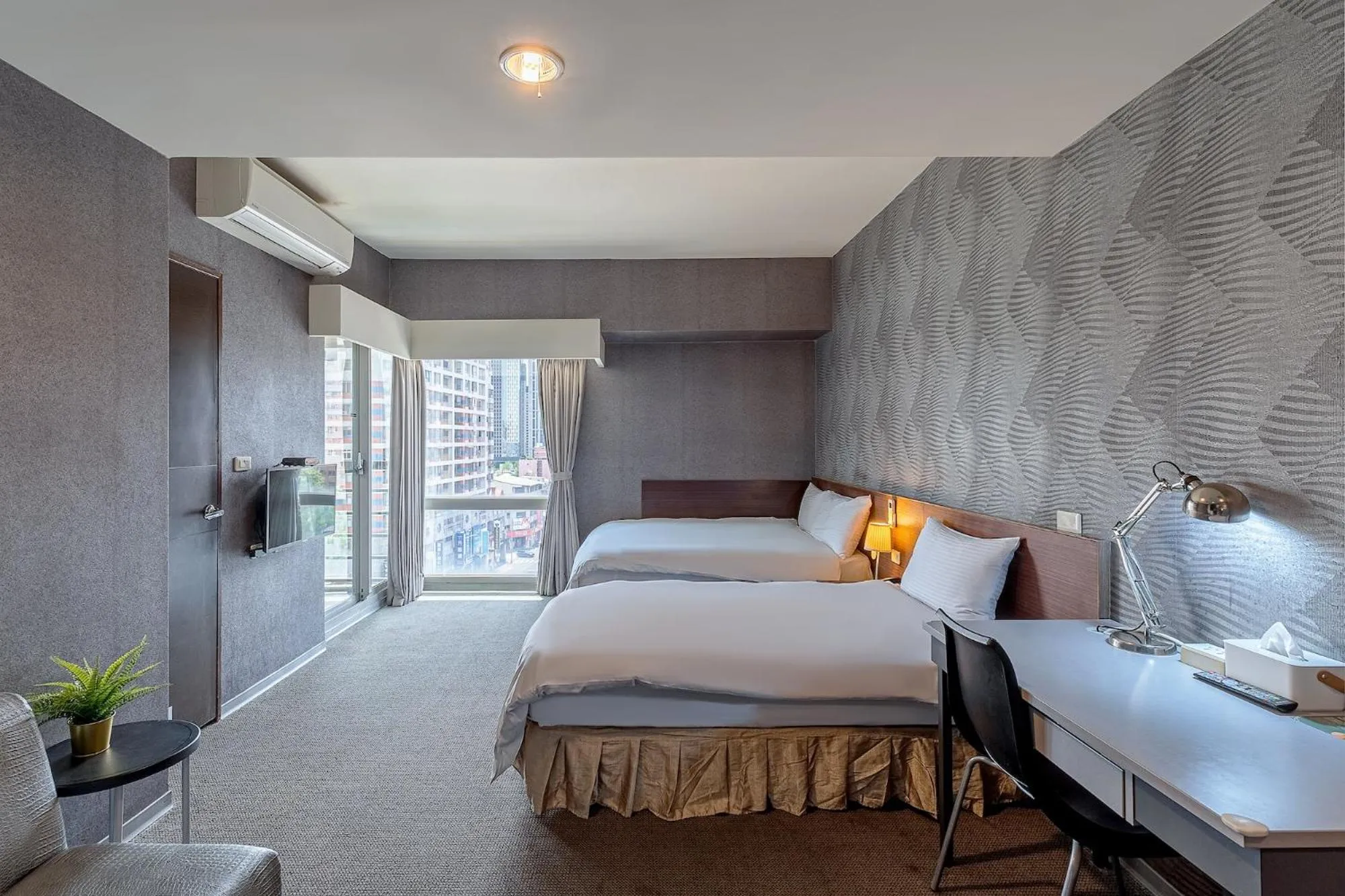 Bed in The Galerie Hotel