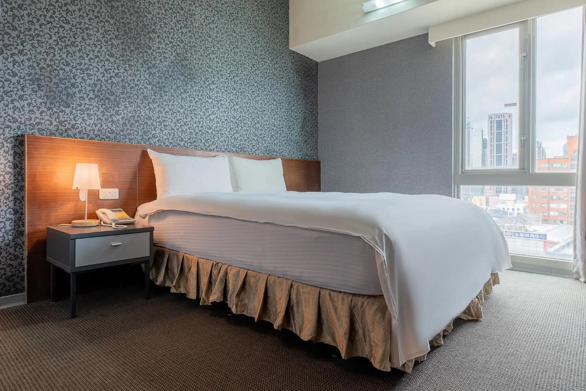 Bed in The Galerie Hotel