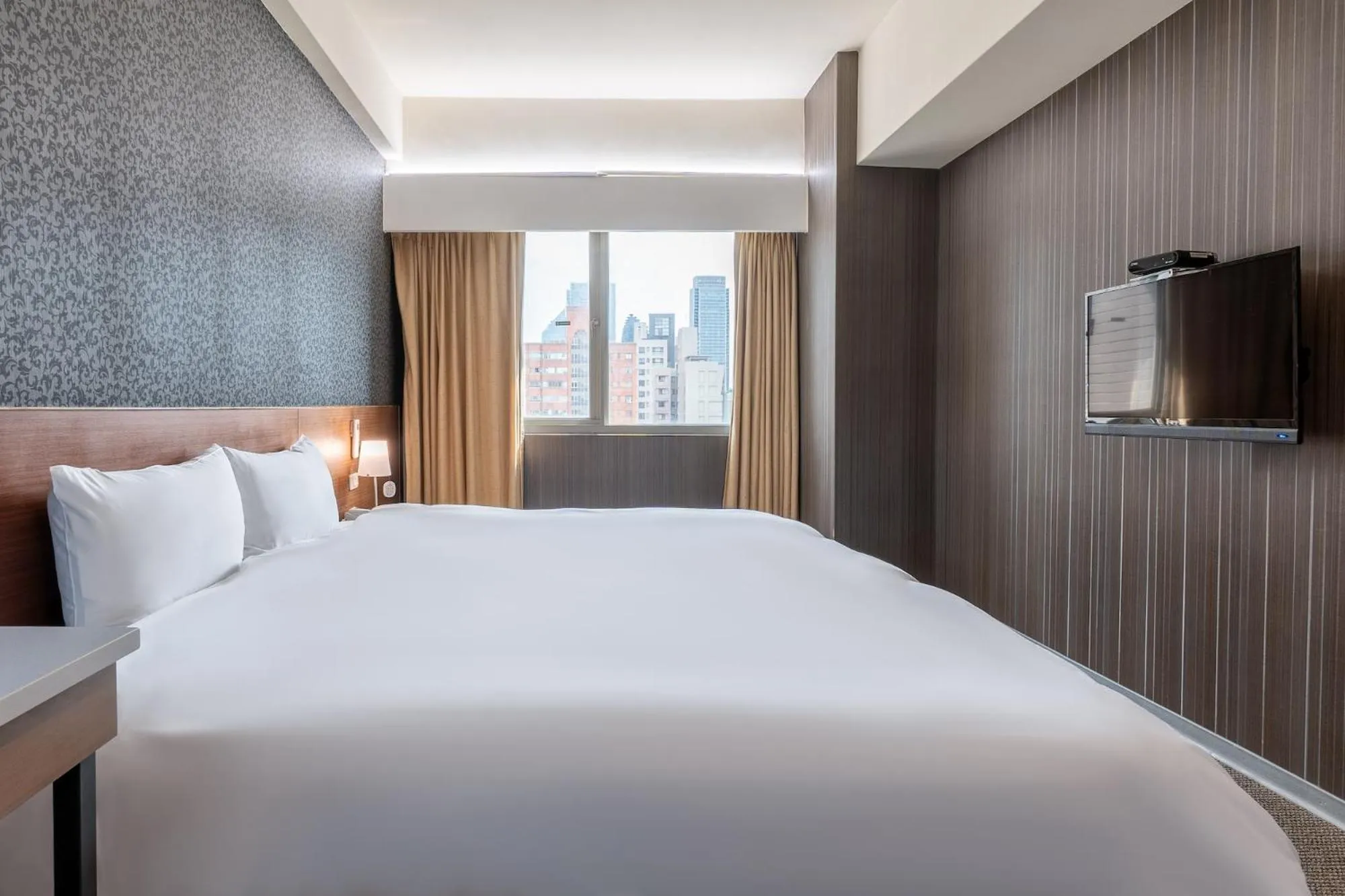 Bed in The Galerie Hotel