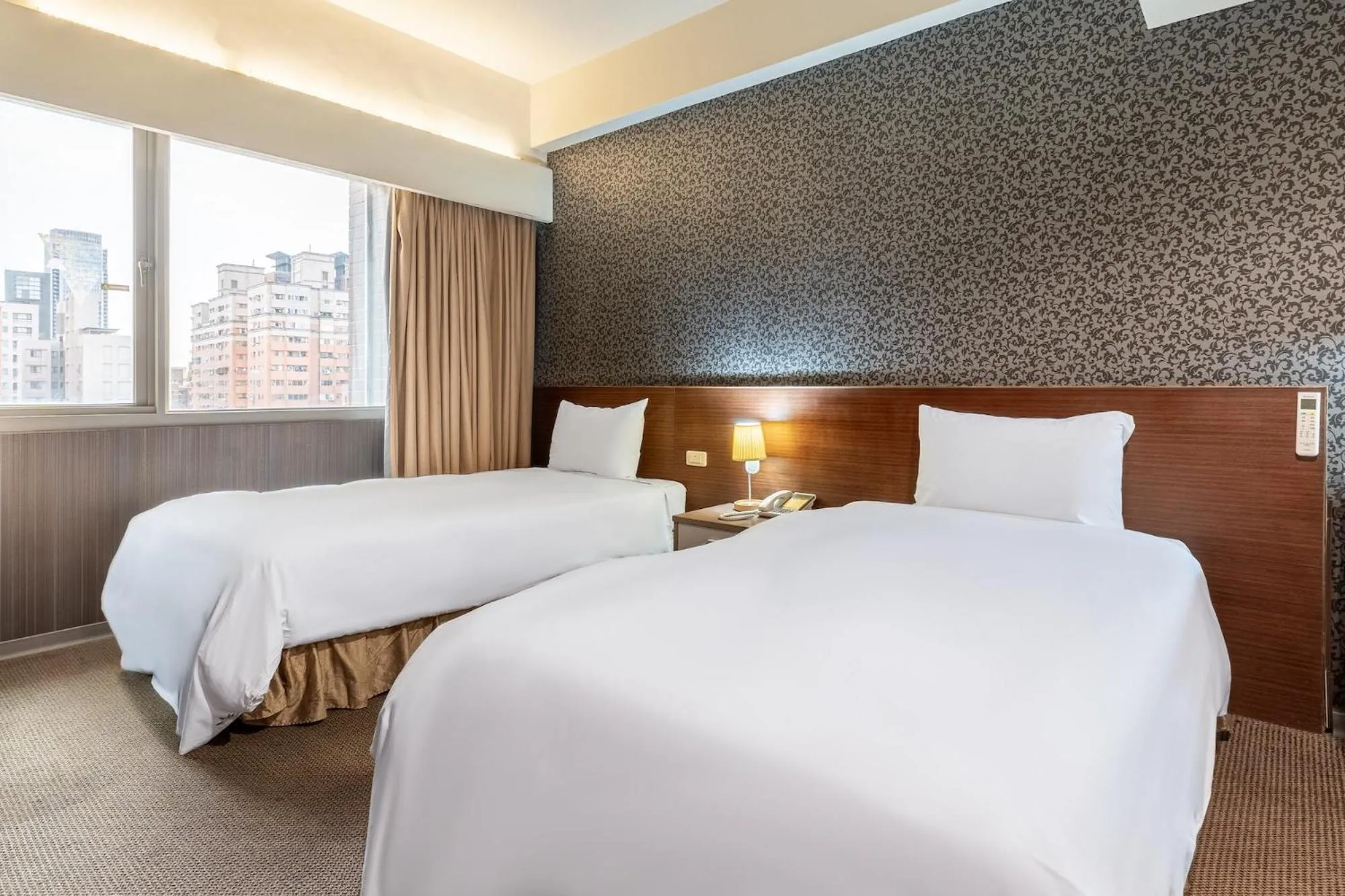 Bed in The Galerie Hotel