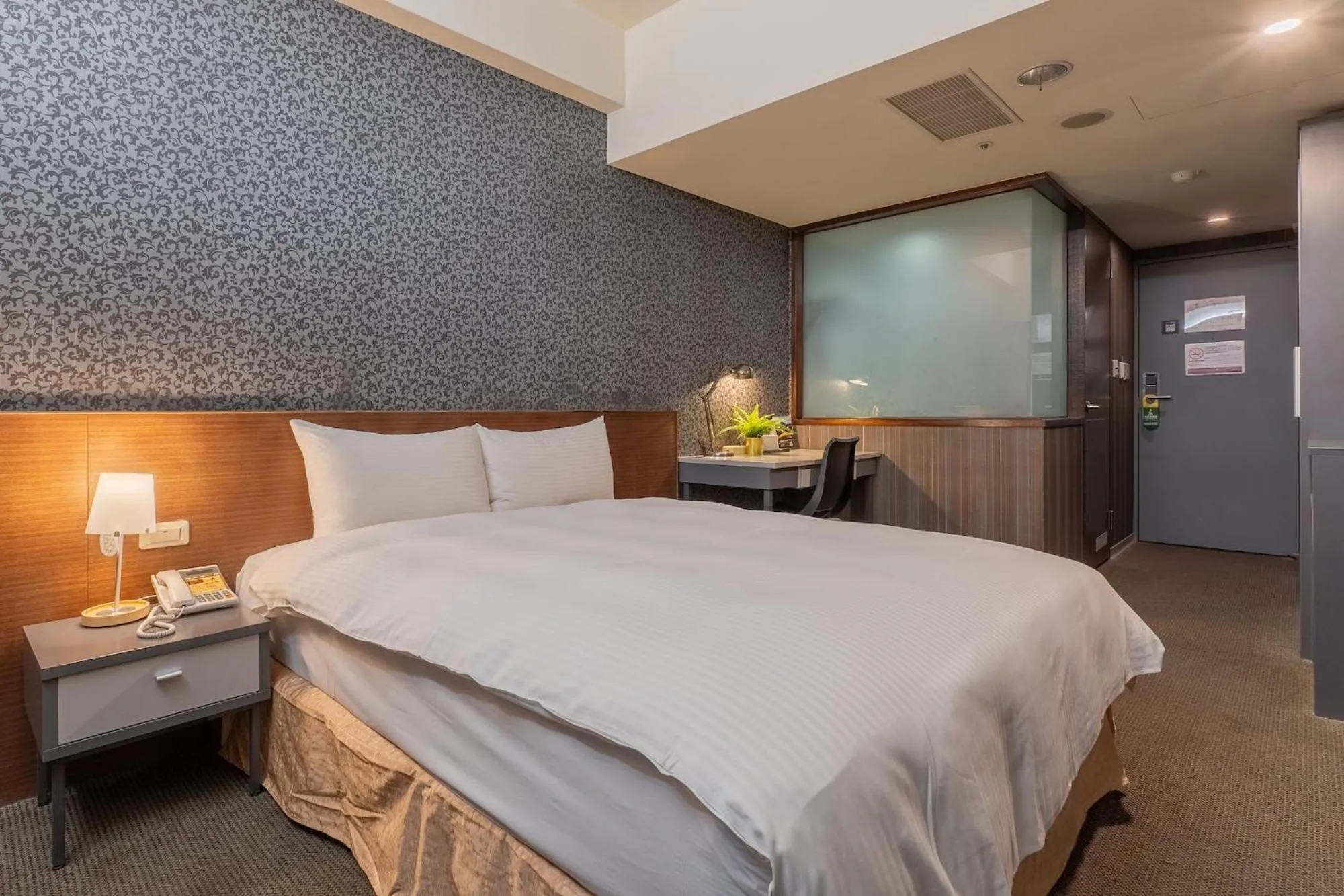 Bed in The Galerie Hotel