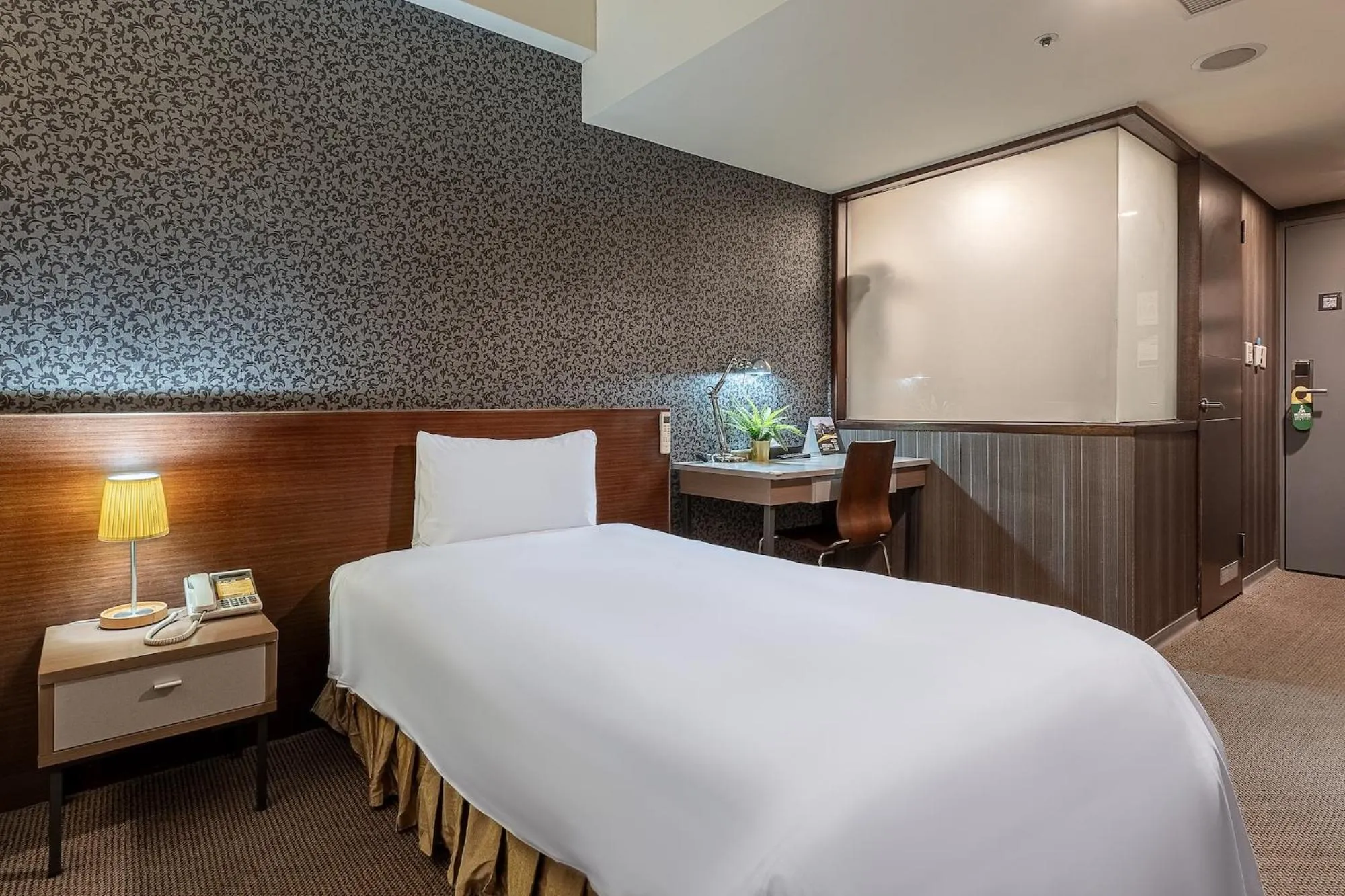 Bed in The Galerie Hotel