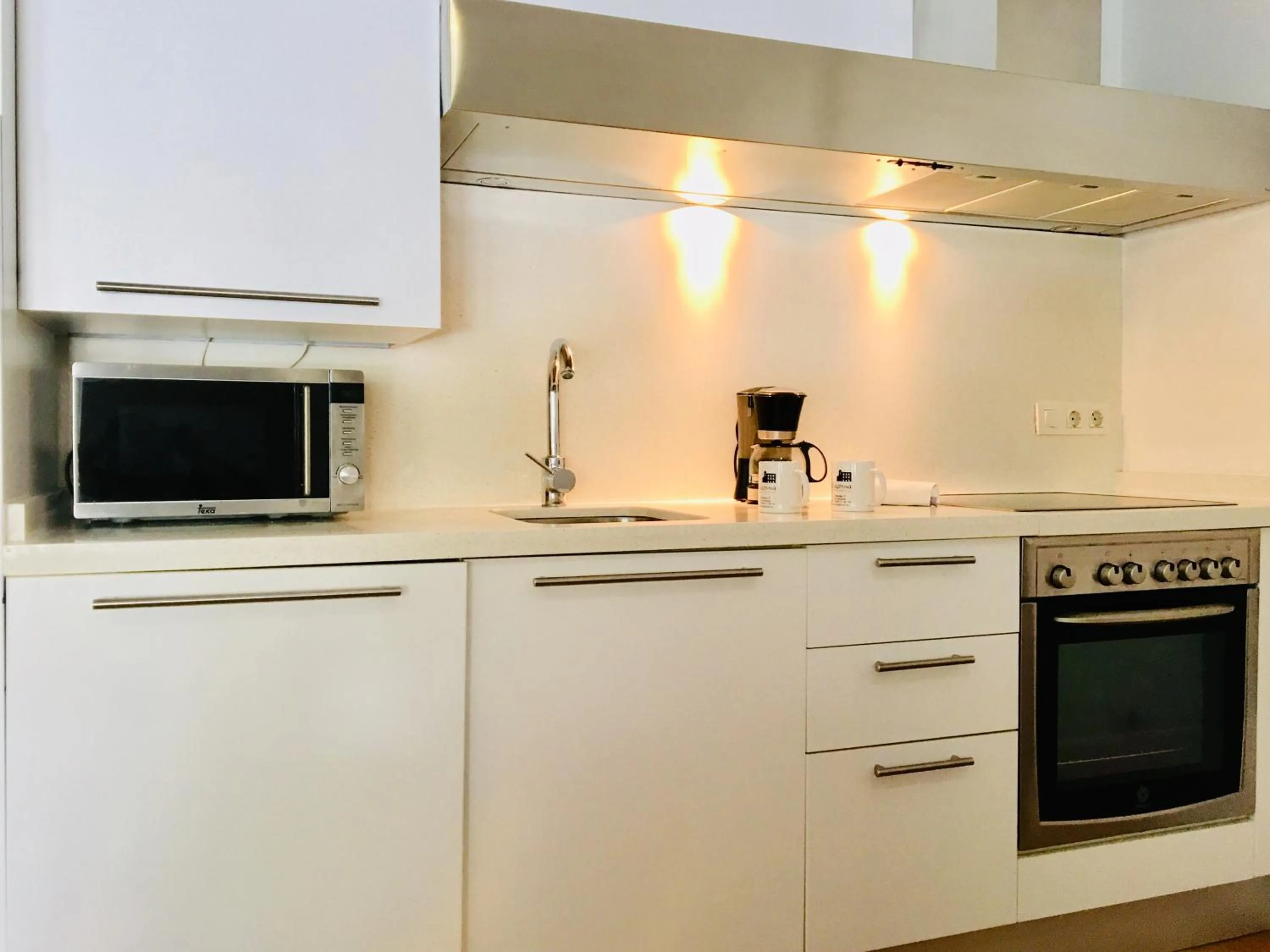 Kitchen or kitchenette in Apartamentos Santa Faz by Be Alicante