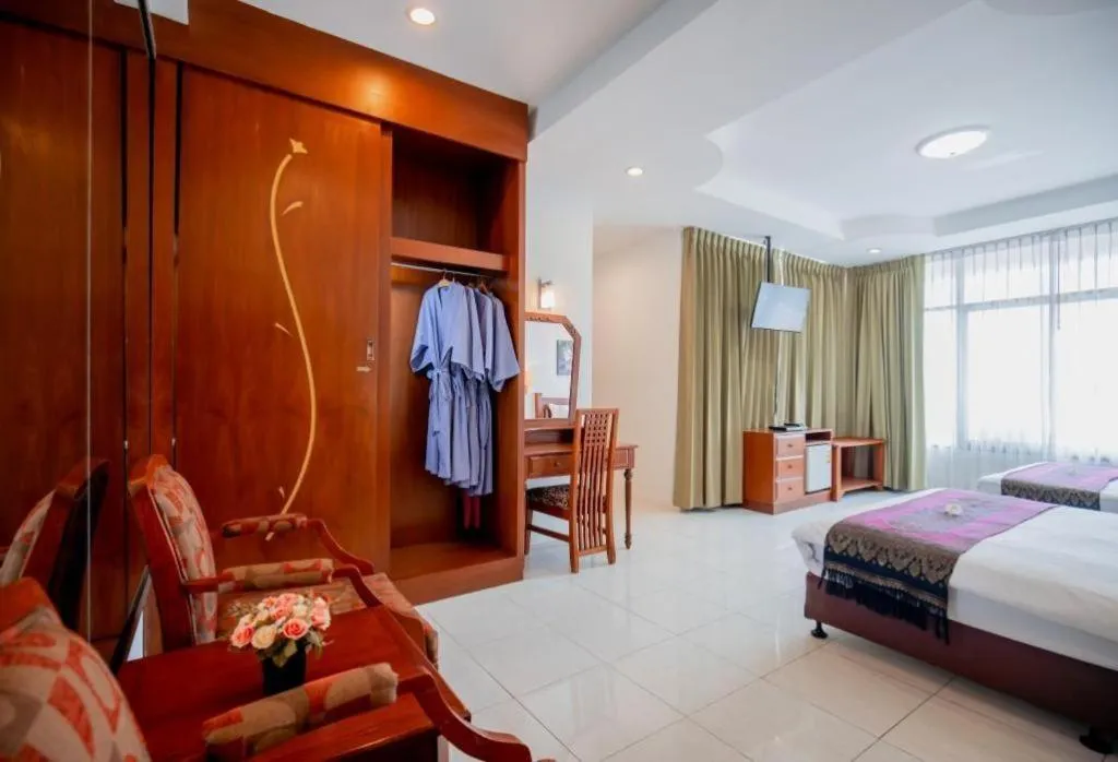 Bed in Hyton Leelavadee Hotel