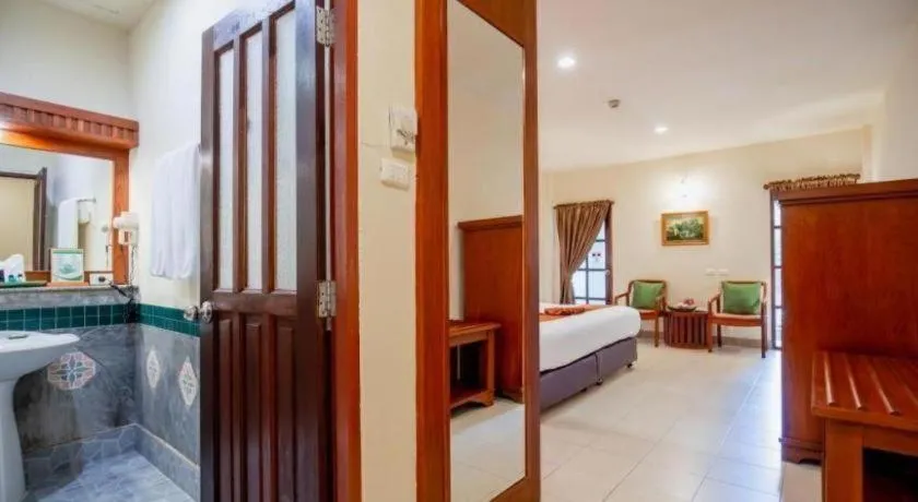 Bed in Hyton Leelavadee Hotel