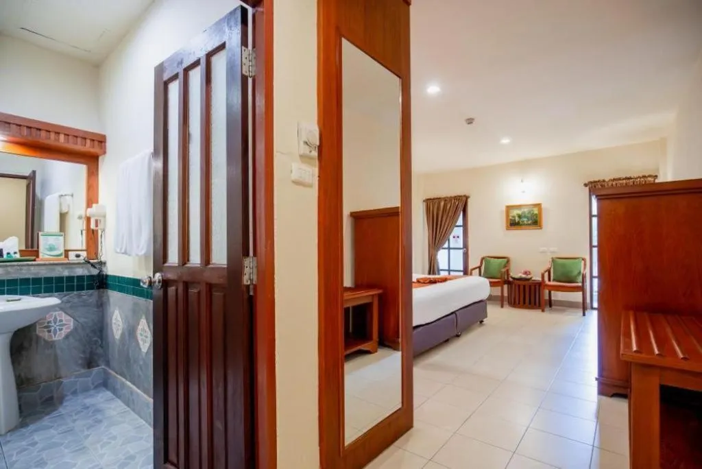 Bed in Hyton Leelavadee Hotel