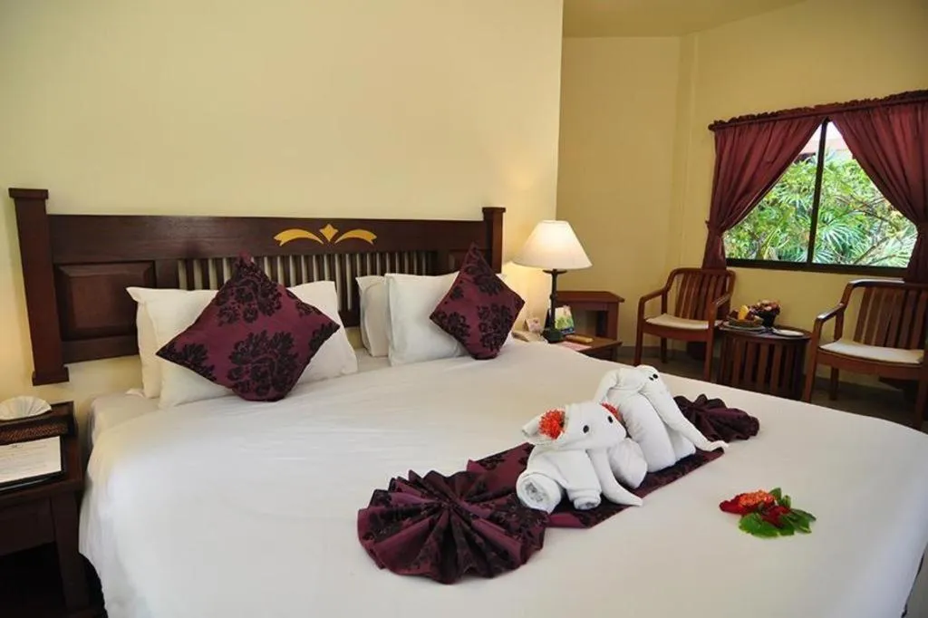 Bed in Hyton Leelavadee Hotel