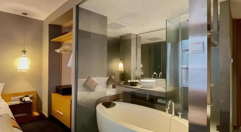 Bed in Guangzhou Carat Hotel