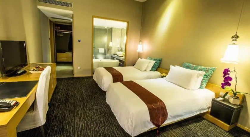 Bed in Guangzhou Carat Hotel