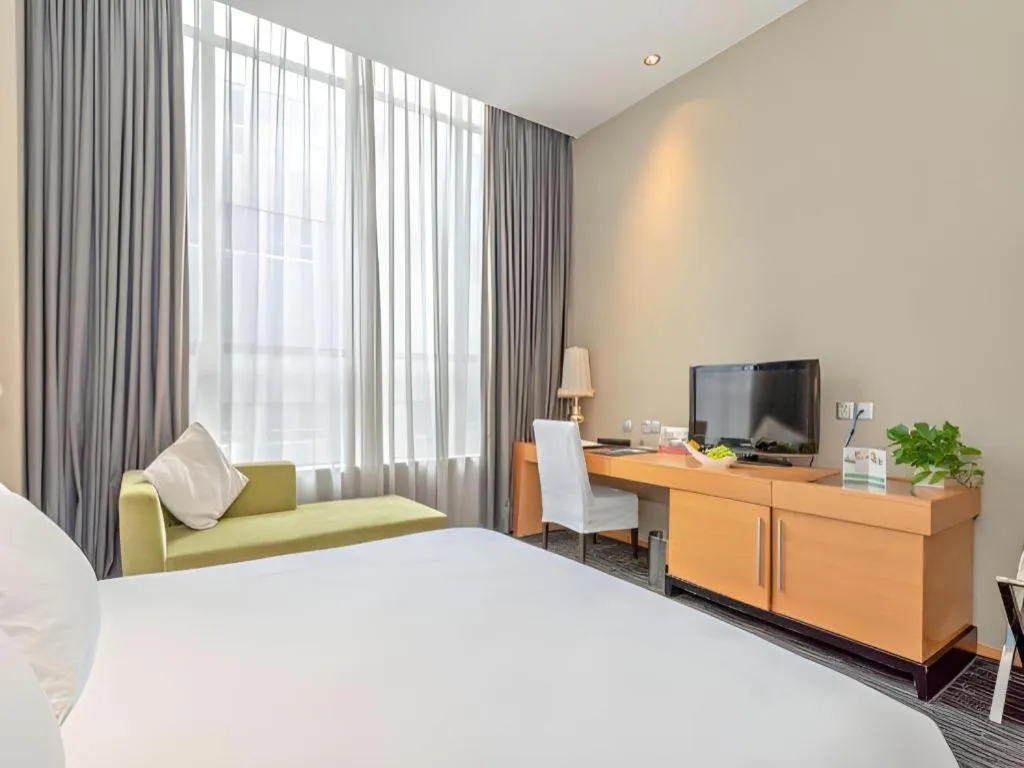 Bed in Guangzhou Carat Hotel