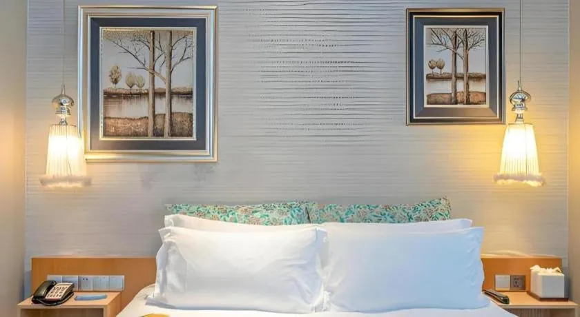 Bed in Guangzhou Carat Hotel