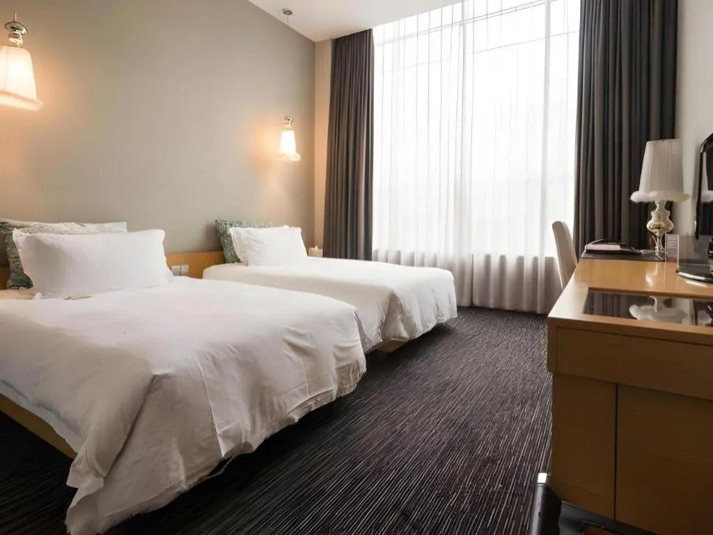 Bed in Guangzhou Carat Hotel