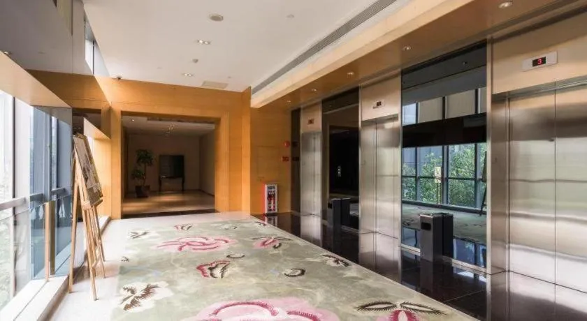 Bed in Guangzhou Carat Hotel