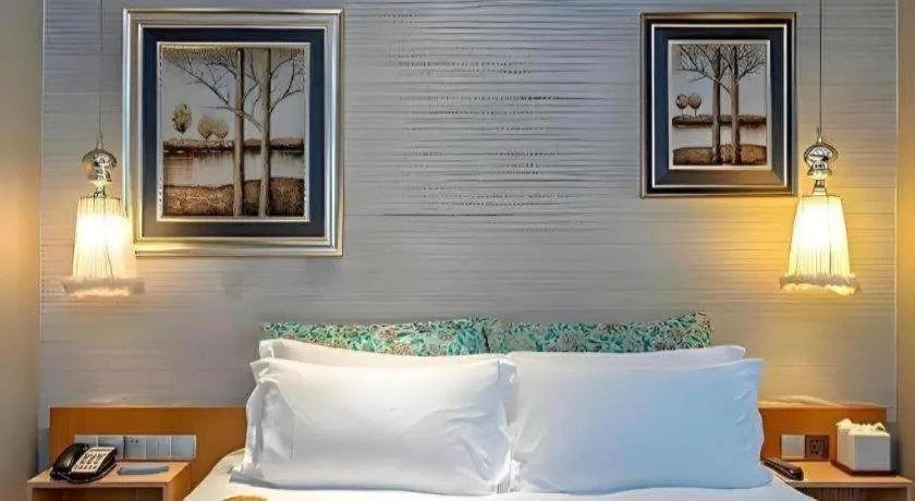 Bed in Guangzhou Carat Hotel