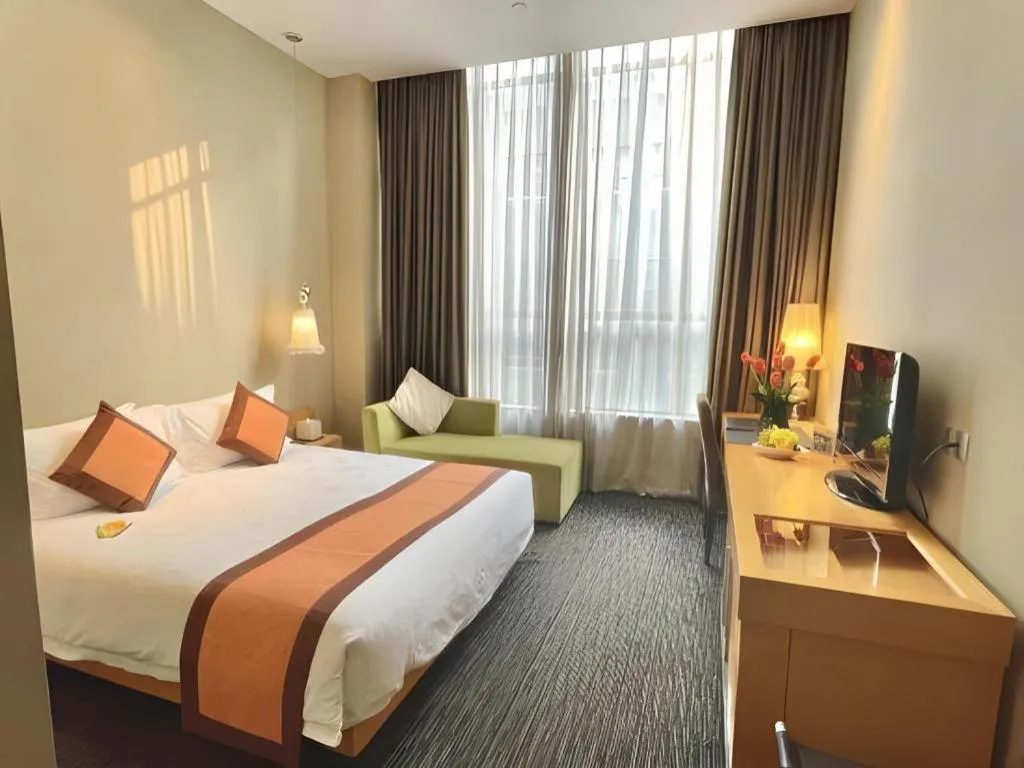 Bed in Guangzhou Carat Hotel