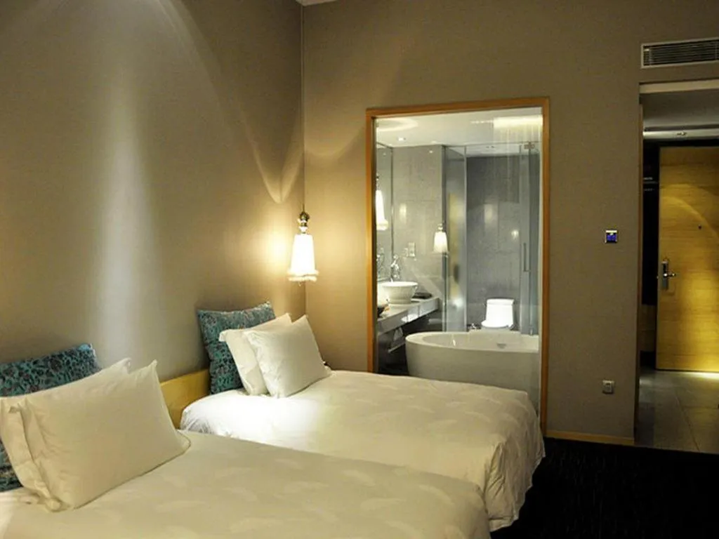 Bed in Guangzhou Carat Hotel