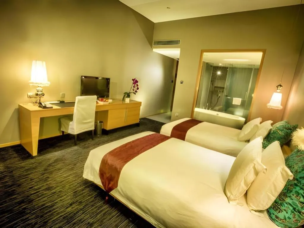 Bed in Guangzhou Carat Hotel