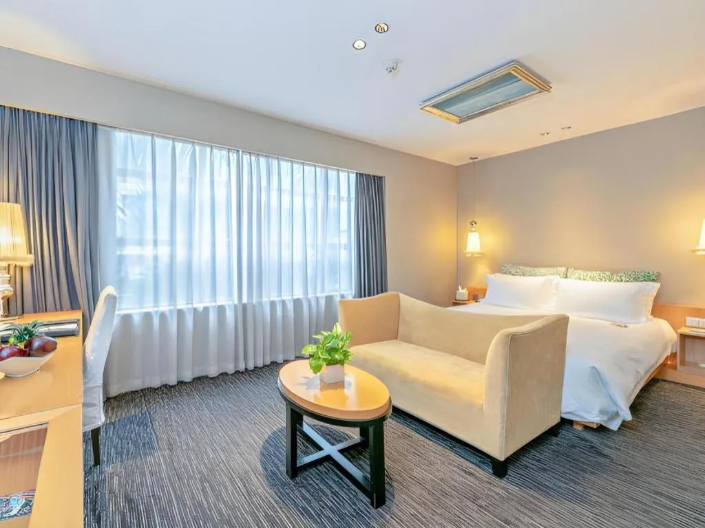 Bed in Guangzhou Carat Hotel