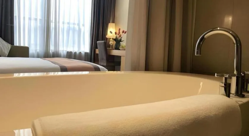 Bed in Guangzhou Carat Hotel