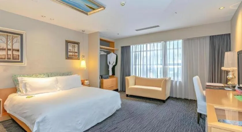 Bed in Guangzhou Carat Hotel