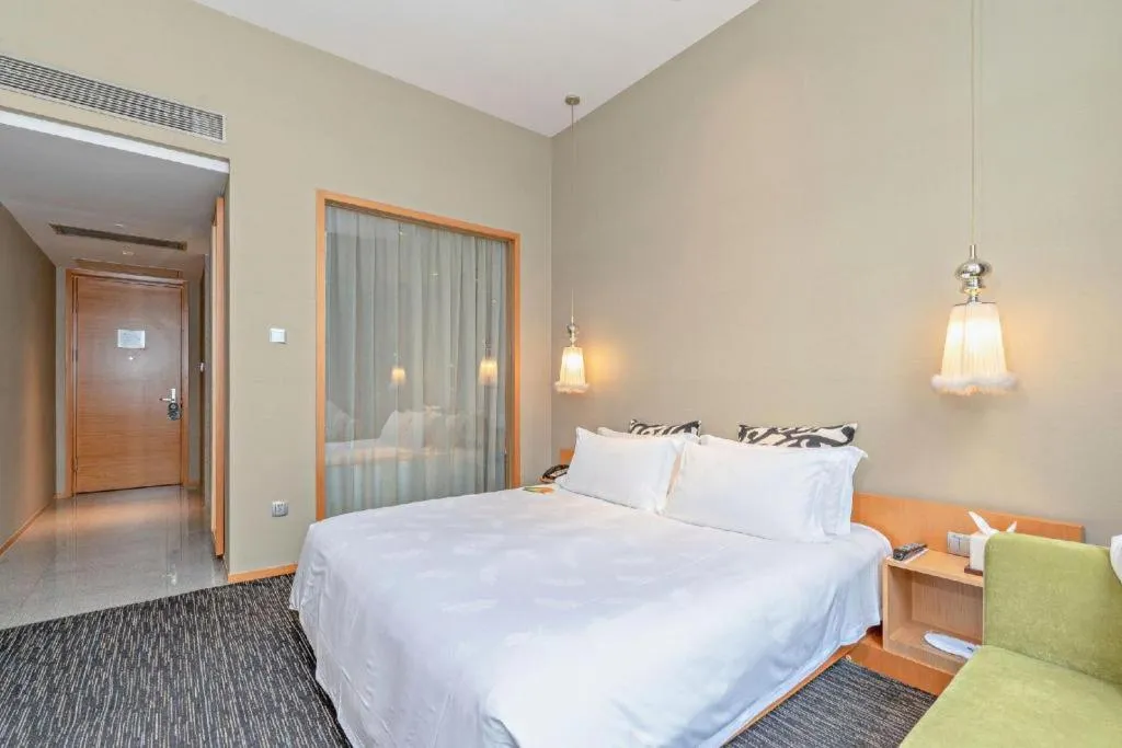 Bed in Guangzhou Carat Hotel