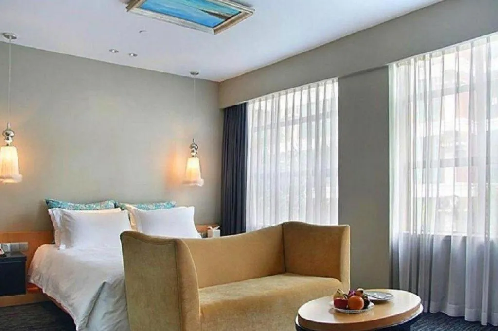 Bed in Guangzhou Carat Hotel