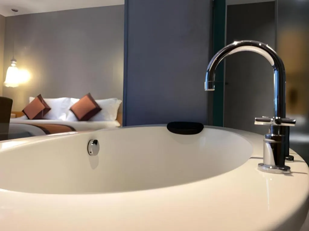 Bed in Guangzhou Carat Hotel