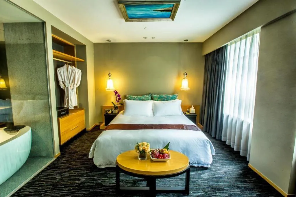 Bed in Guangzhou Carat Hotel