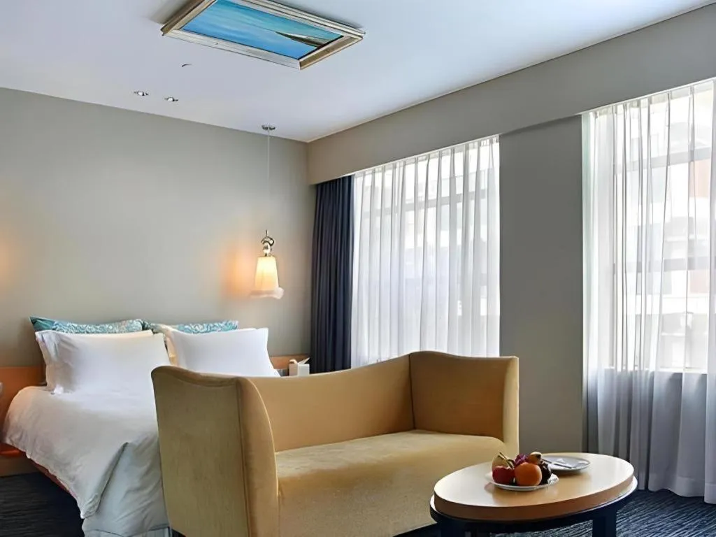 Bed in Guangzhou Carat Hotel