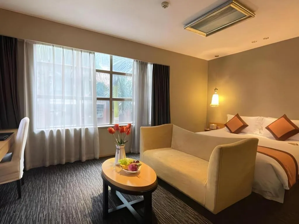 Bed in Guangzhou Carat Hotel