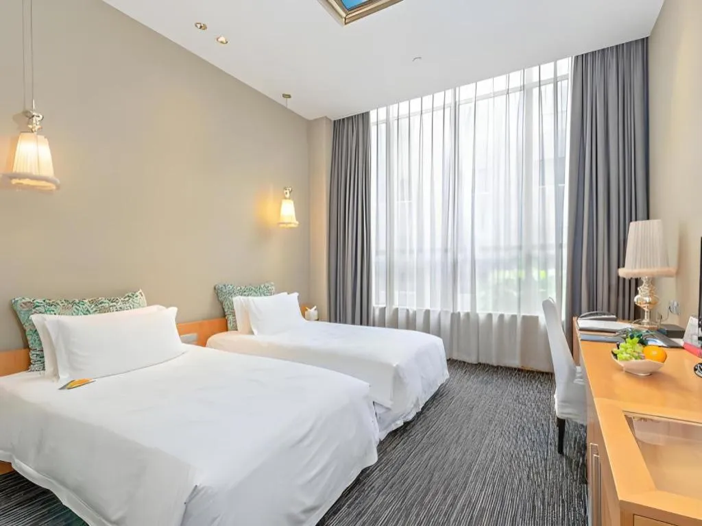 Bed in Guangzhou Carat Hotel