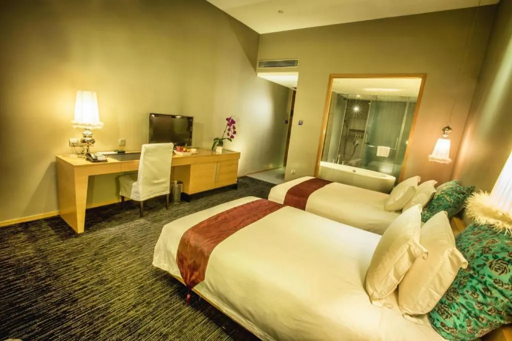 Bed in Guangzhou Carat Hotel