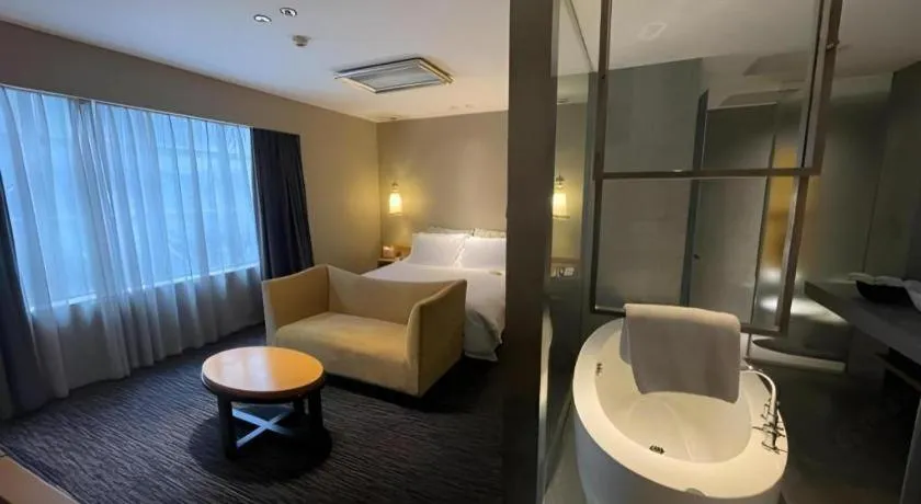 Bed in Guangzhou Carat Hotel